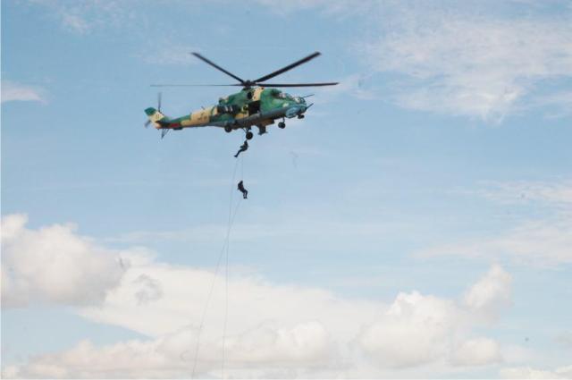 Nigerian Army Special Forces commandos rappelling off a NAF Mi-24V during 'NADCEL 2012' at Jaji