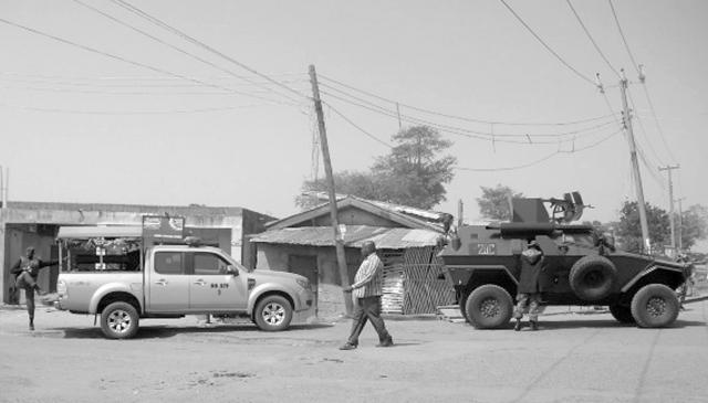 Urban operations: An Army Otokar Cobra APC followed by a Police Mobile Force Ford Ranger 4WD truck